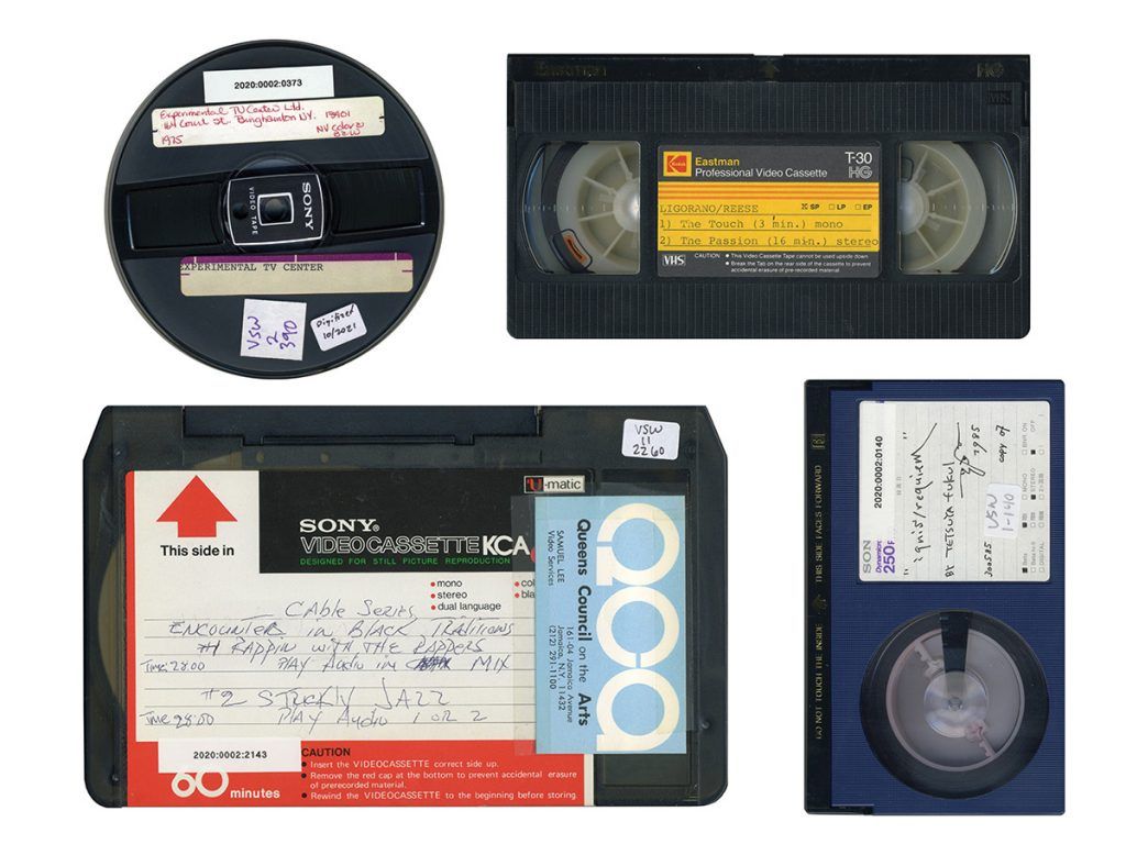 Four video tapes in different formats.