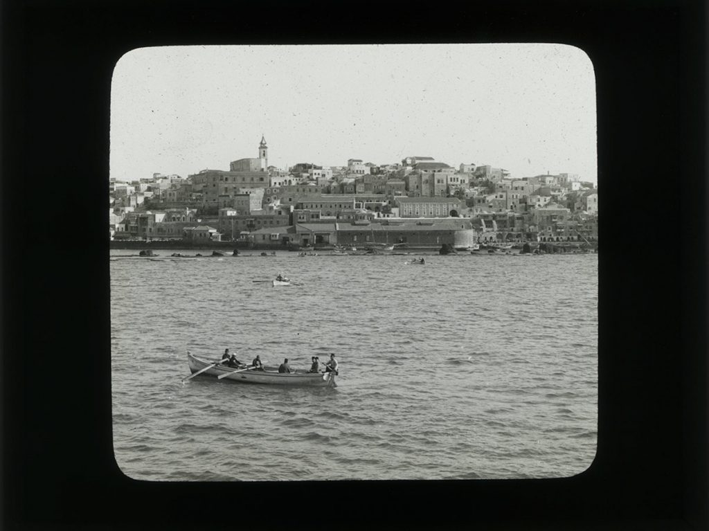 Lantern slide image of a boat in water.
