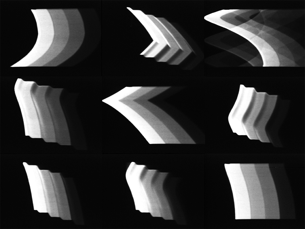Grid of nine black and white abstract shapes.