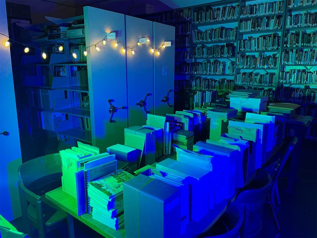 A research center with strange blue and green lighting.