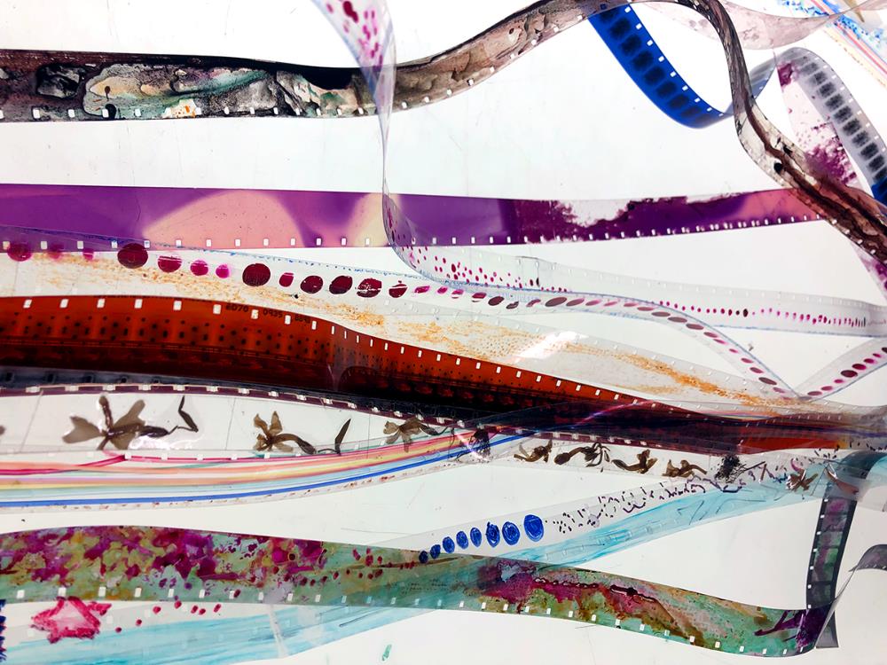 Strings of colorful handmade film.