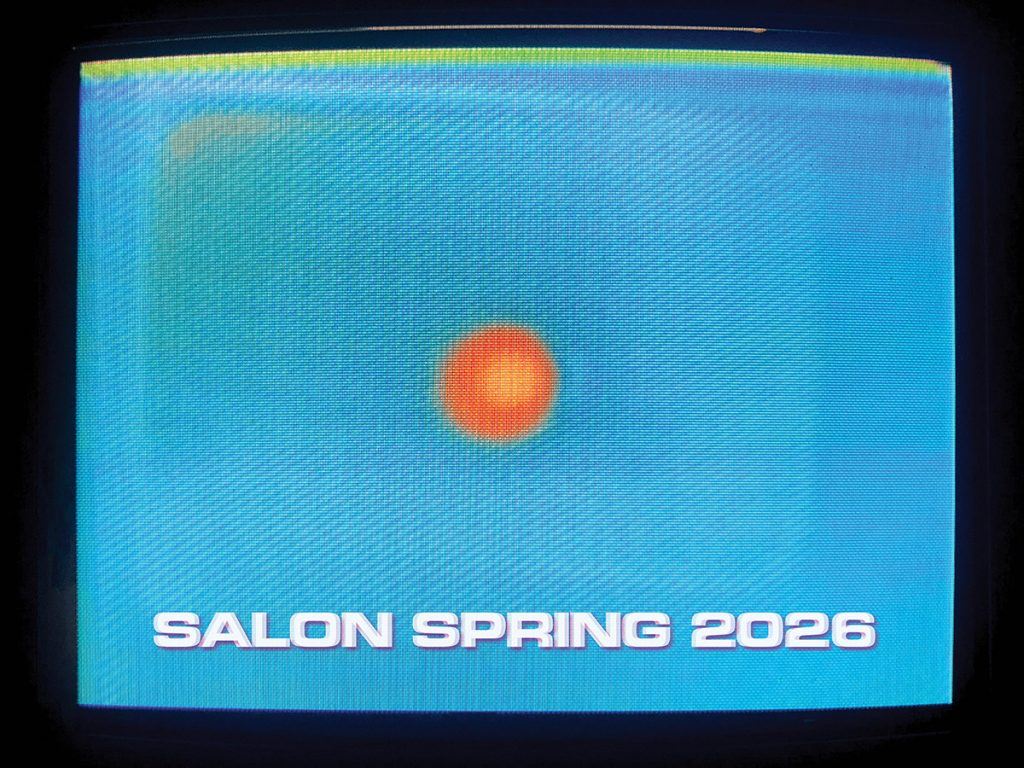 A blue, glowing TV monitor with an orange dot in the middle.