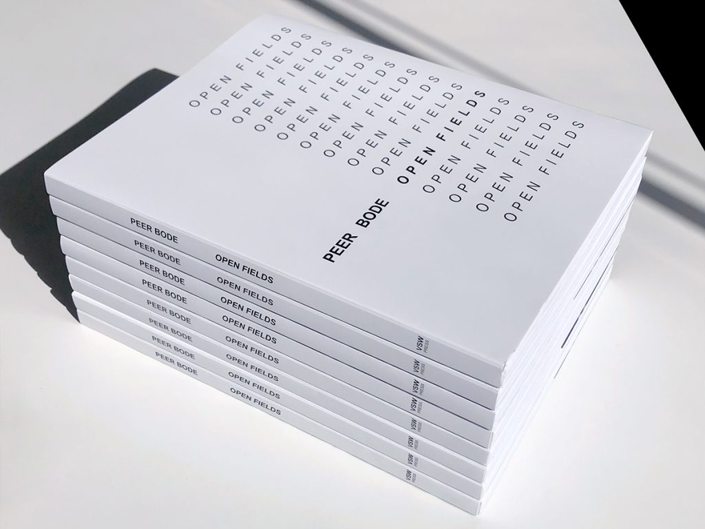 A stack of white books.