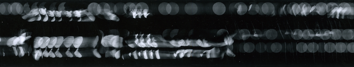 <strong>Barbara Blondeau</strong>[female dancer with circle lights], ca. 1970Gelatin silver print, 5.75 x 78.5 cmVisual Studies Workshop Collection Estate of Barbara Blondeau1977:0012:0016
